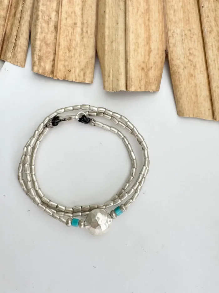 ocean inspired silver jewellery. Pure silver wrap bracelet minimal everyday style for a beach vibes look- water safe for everyday wear. 3 styles in 1