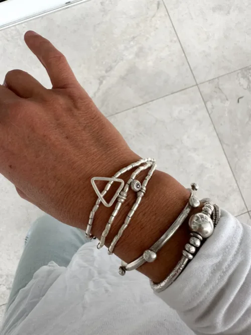 triangle pendant sterling silver wrap bracelet with evil eye pendant. 3 ways to wear - wrap, anklet-necklace