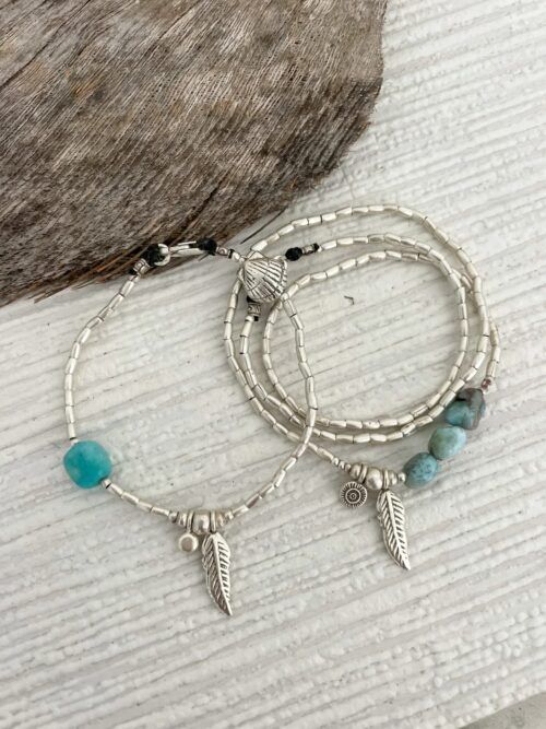 ocean inspired silver jewellery. Pure silver wrap bracelet with silver feather charm and larimar gemstone - for a beach vibes look- water safe for everyday wear. 3 styles in 1