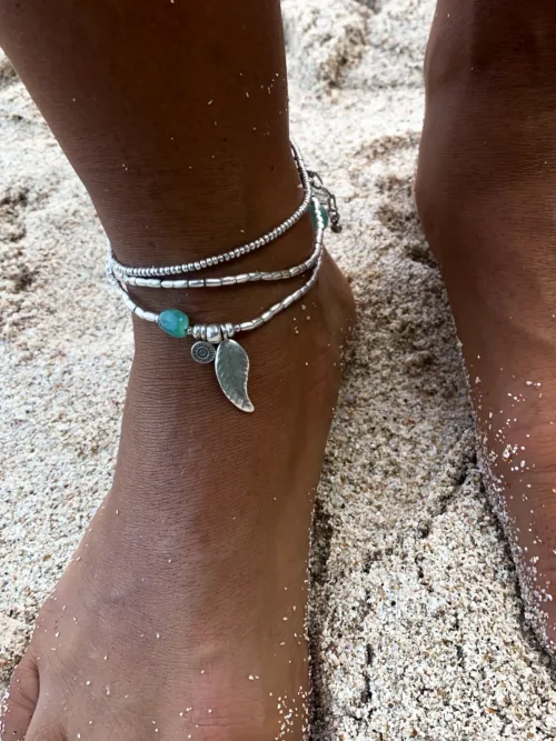 ocean inspired silver jewellery. Pure silver wrap bracelet with silver feather charm and chrysoprase gemstone - for a beach vibes look- water safe for everyday wear. 3 styles in 1