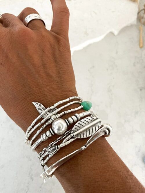 ocean inspired silver jewellery. Pure silver wrap bracelet with silver feather charm and chrysoprase gemstone - for a beach vibes look- water safe for everyday wear. 3 styles in 1