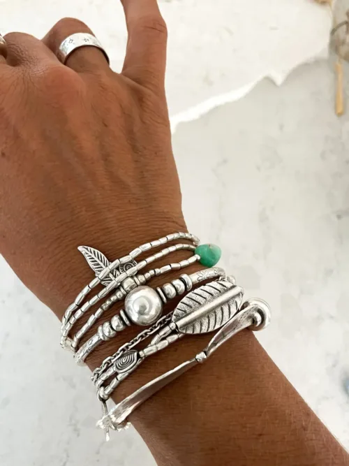 ocean inspired silver jewellery. Pure silver wrap bracelet with silver feather charm and chrysoprase gemstone - for a beach vibes look- water safe for everyday wear. 3 styles in 1