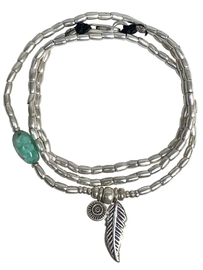ocean inspired silver jewellery. Pure silver wrap bracelet with silver feather charm and chrysoprase gemstone - for a beach vibes look- water safe for everyday wear. 3 styles in 1. tug proof