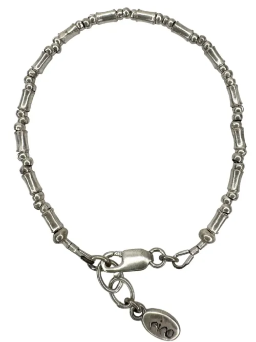 pure silver bracelet perfect two add texture to a bracelet stack. bamboo like silver minimal style bracelet