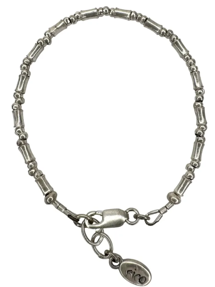 pure silver bracelet perfect two add texture to a bracelet stack. bamboo like silver minimal style bracelet