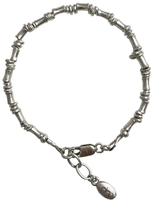 pure silver bracelet perfect two add texture to a bracelet stack. bamboo like silver minimal style bracelet