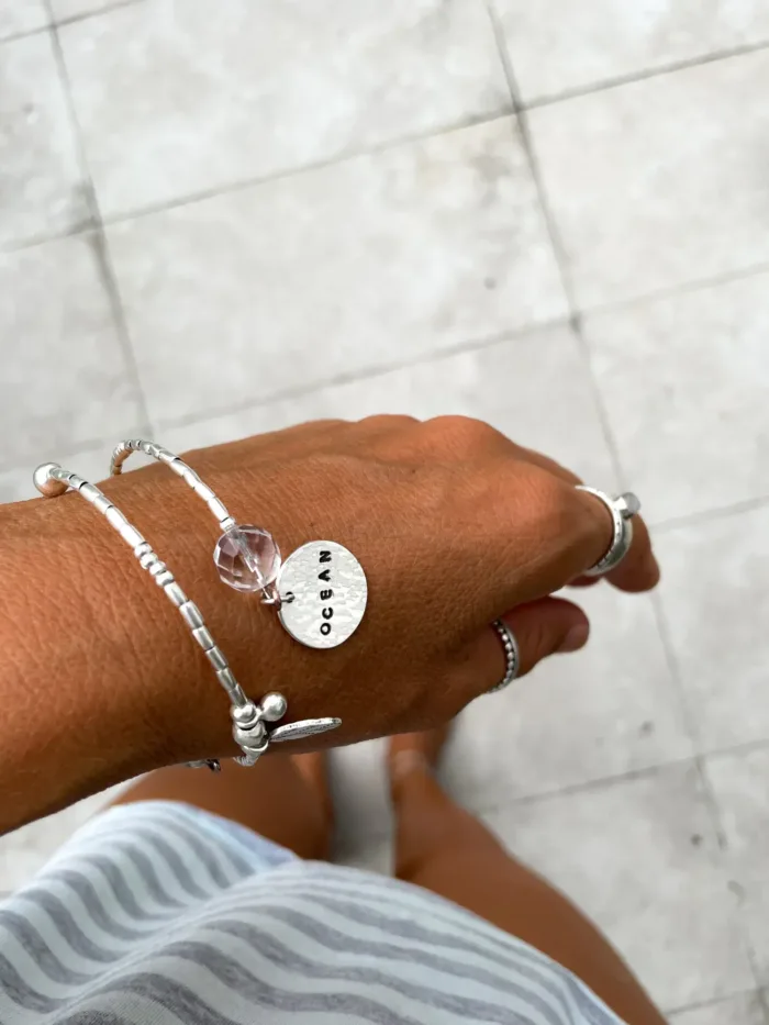 memory wire double wrap bracelet with pure silver and crystal quartz gemstone. Customisable charm pendant
