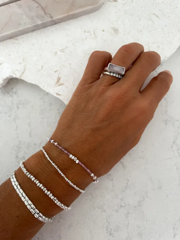 unique handmade pure silver bracelets. add texture to your bracelet stack. women's silver jewellery water safe