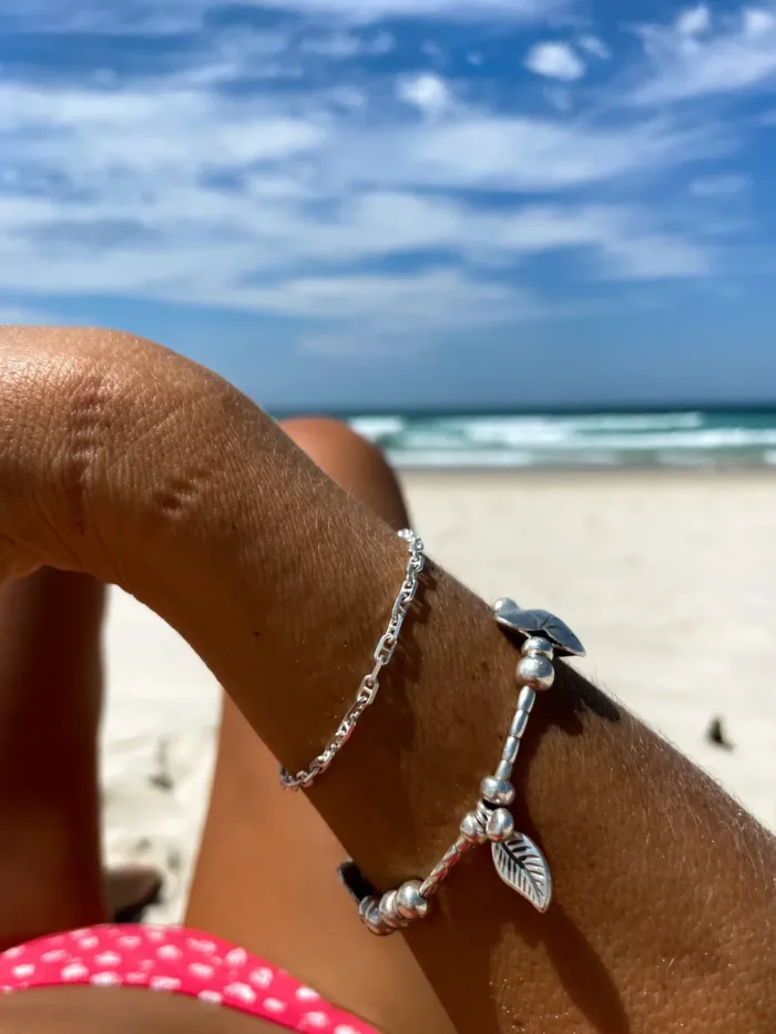 pure silver women's bracelet. heart and shell details - ocean safe. beach girl vibes