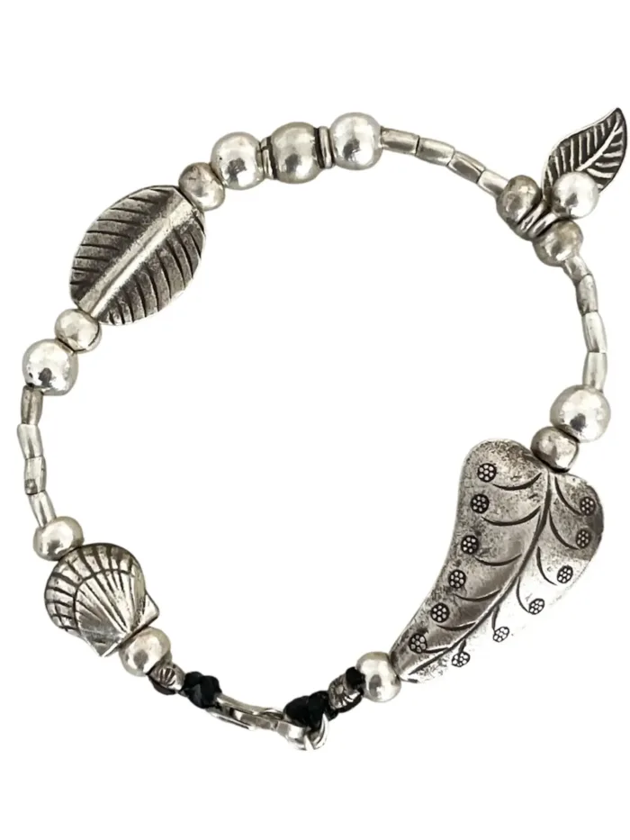 pure silver women's bracelet. heart and shell details - ocean safe. beach girl vibes