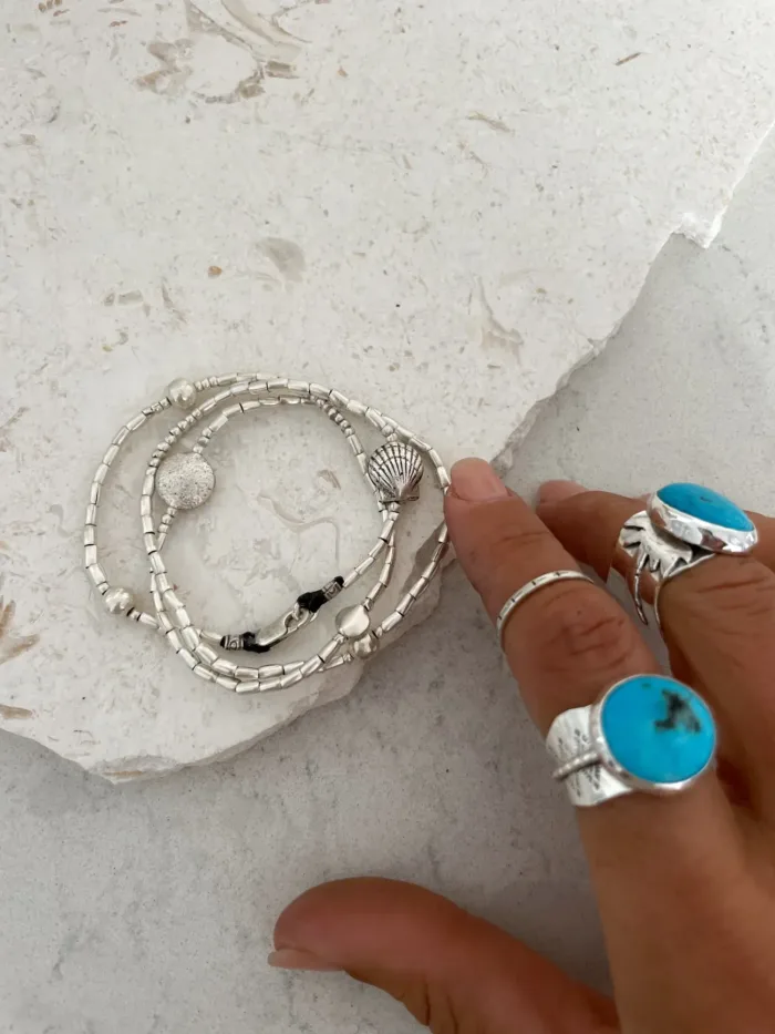 beach inspired pure silver triple wrap bracelet. style it 3 ways. bracelet, anklet or necklace. featuring silver shells. water safe