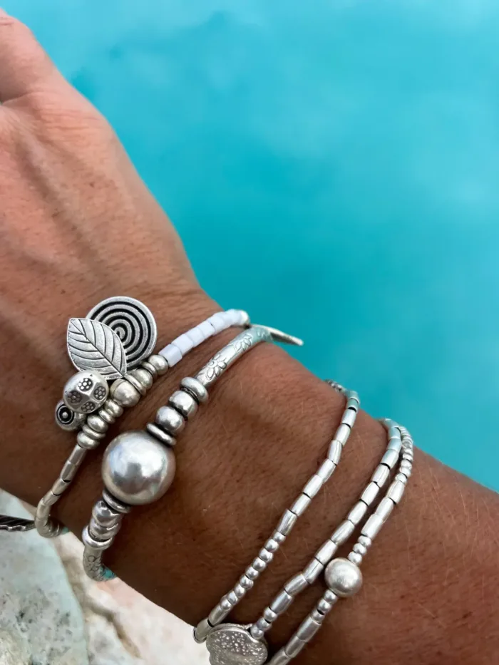 ocean inspired silver jewellery. Pure silver wrap bracelet with clam shell for a beach vibes look- water safe for everyday wear. 3 styles in 1