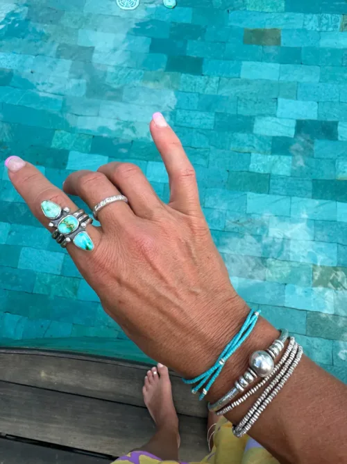 Handmade pure silver wrap bracelet featuring a bright summer colour seed bead of your choice – a great minimal wrap bracelet style for everyday wear