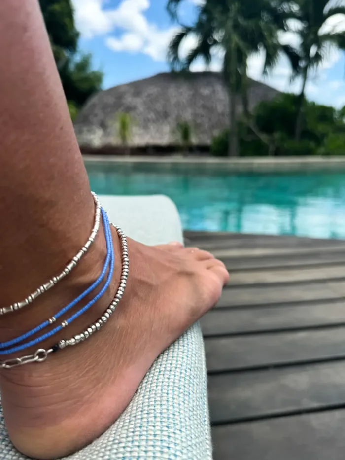 Handmade pure silver wrap bracelet featuring a bright summer colour seed bead of your choice – a great minimal wrap bracelet style for everyday wear