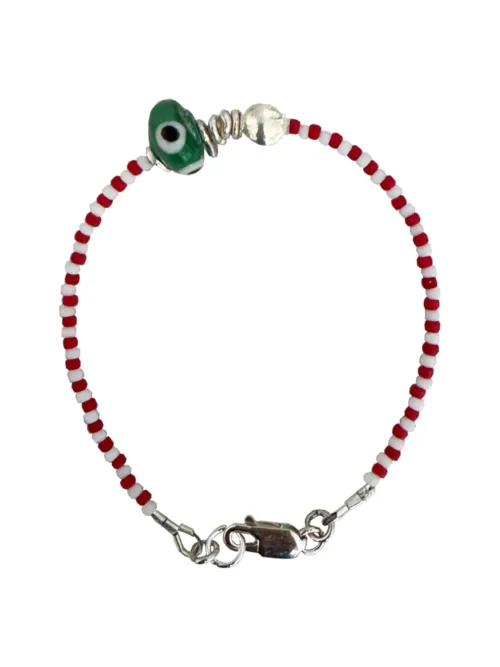 Handmade pure silver bracelet featuring colourful seed beads and an evil eye – a great minimal bracelet to add to your bracelet stack