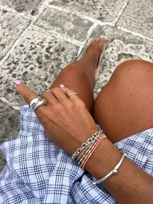 Handmade pure silver wrap bracelet featuring peach colour seed beads – a great minimal wrap bracelet style for everyday wear