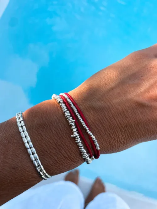 Handmade pure silver wrap bracelet featuring red colour seed beads – a great minimal wrap bracelet style for everyday wear