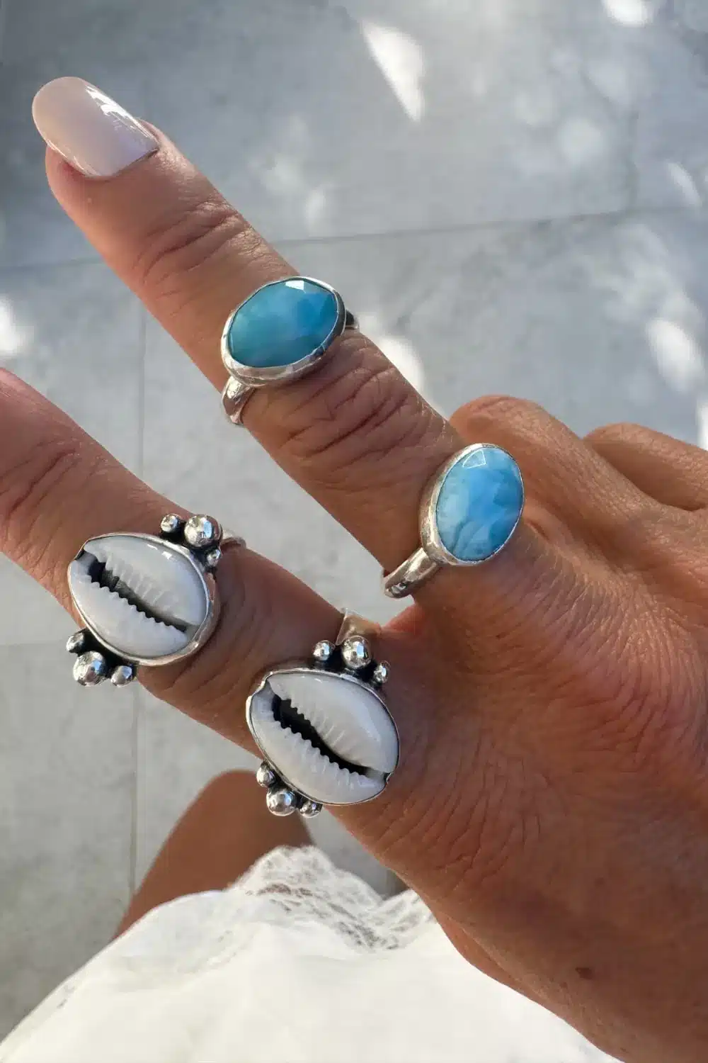 handmade cowrie shell ring and larimar silver rings. Made in Sydney australia. Ocean safe