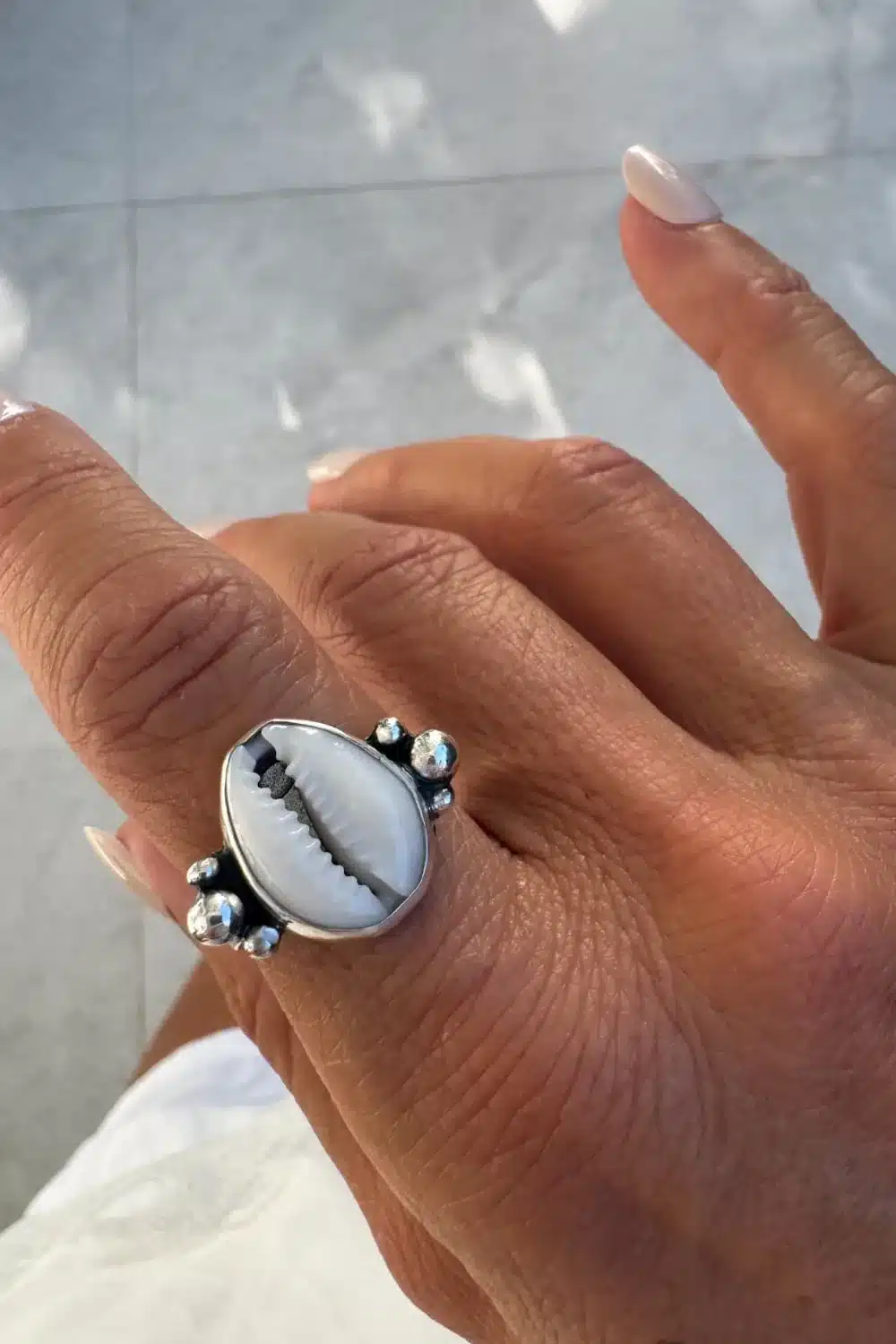 handmade cowrie shell ring in Sydney australia. Ocean safe