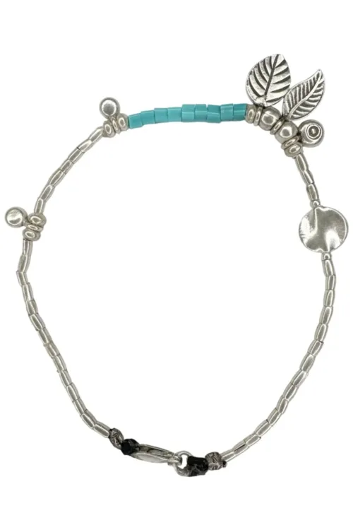 pure silver anklet with turquoise seed beads and lots of pure silver charms. Ocean safe. Silver jewellery for beach lovers.