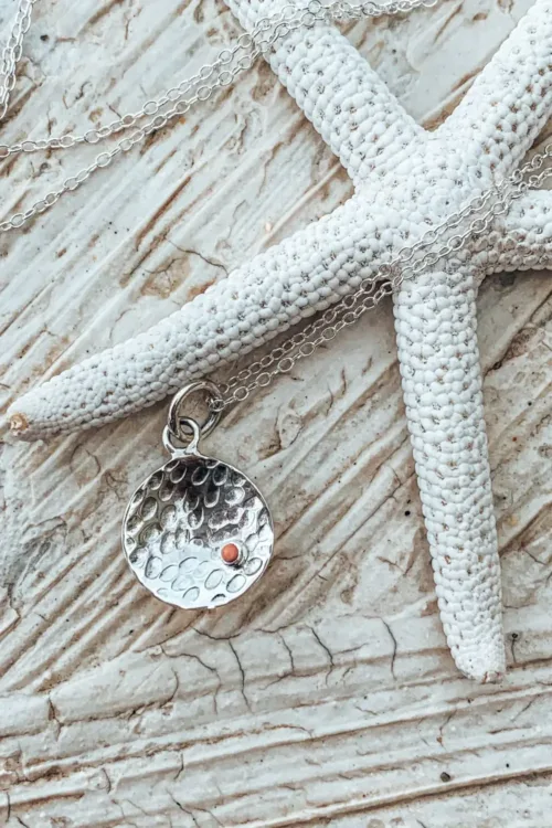 concave silver disc pendant with peach coral necklace on fine sterling silver chain. Handmade in Sydney Australia. Ocean Safe