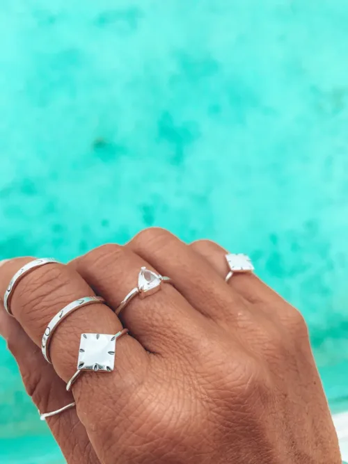 sterling silver ring minimal dainty style for everyday wear. Perfect for a ring stack. Diamond shaped silver disc. Ocean safe