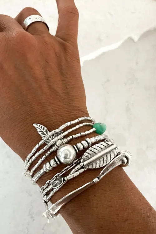 ocean inspired silver jewellery. Pure silver wrap bracelet with silver feather charm and chrysoprase gemstone - for a beach vibes look- water safe for everyday wear. 3 styles in 1
