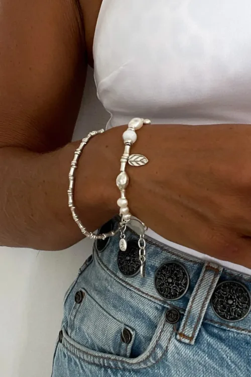 freshwater pearl silver bracelet with lots of charms.pearl bracelet stack