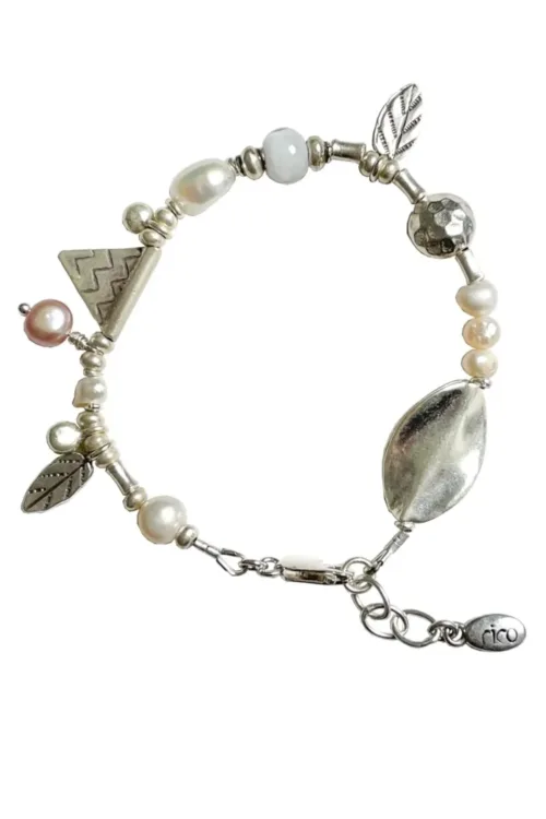 freshwater pearl silver bracelet with lots of charms.