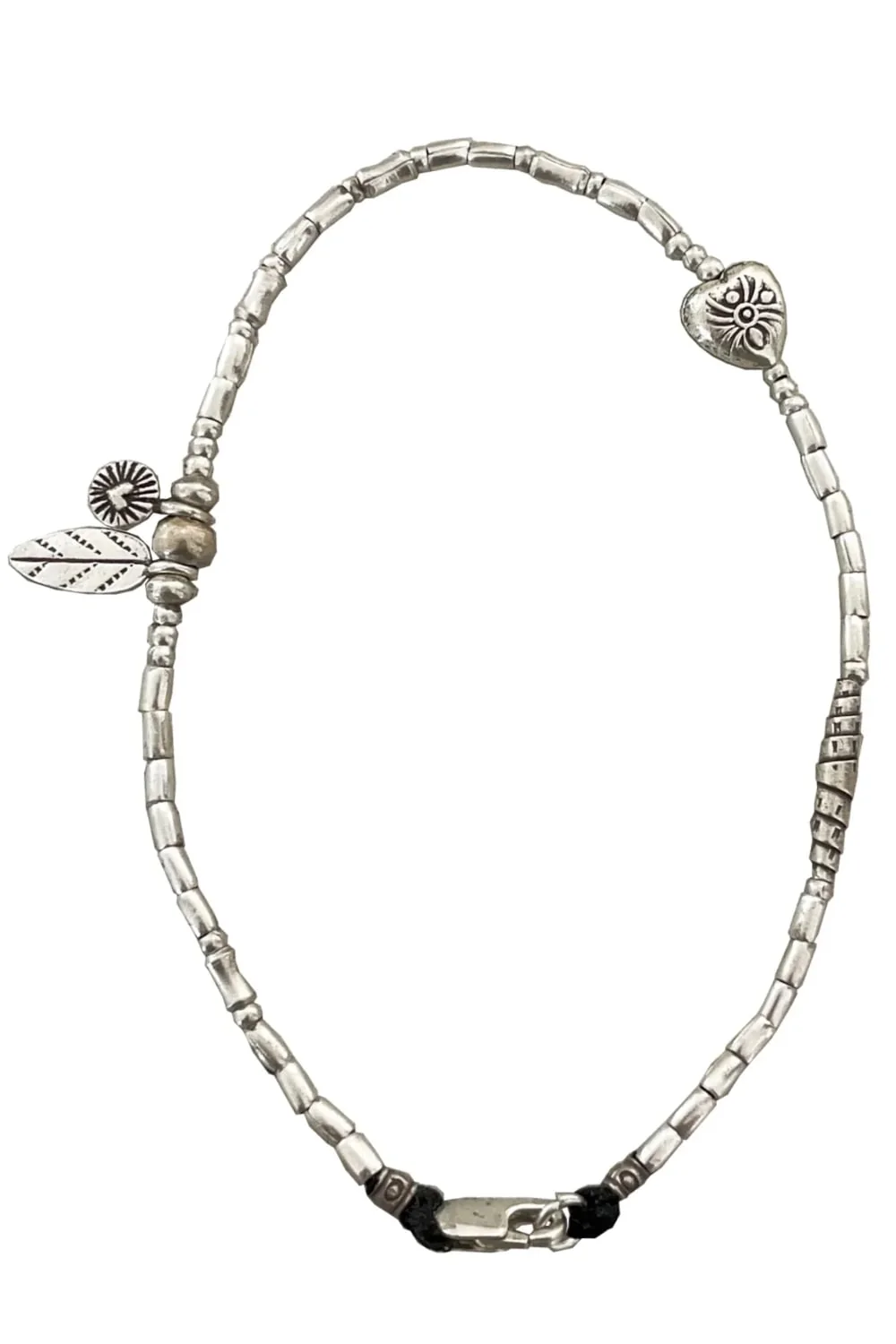 pure silver anklet minimal design. Feature ring silver heart charms. Ocean safe and perfect to wear everyday.