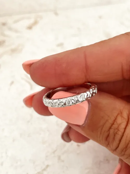 sterling silver ring with molten texture and cubic zircon. ocean safe, great for stacking