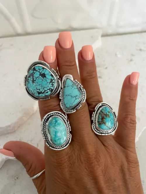 bohemian style large turquoise handmade sterling silver ring. with wide sterling silver ring shank. Ocean safe