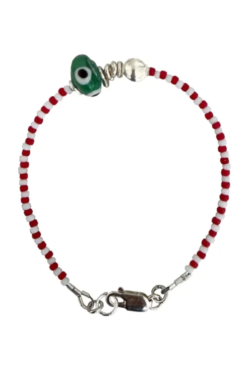 Handmade pure silver bracelet featuring colourful seed beads and an evil eye – a great minimal bracelet to add to your bracelet stack