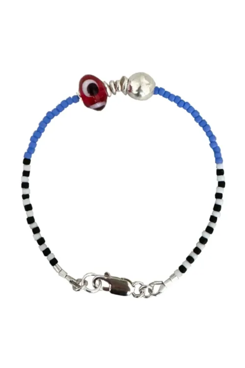 Handmade pure silver bracelet featuring colourful seed beads and an evil eye – a great minimal bracelet to add to your bracelet stack