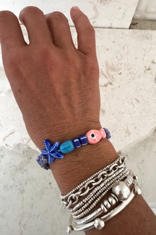 fish macrame bracelet adjustable colourful purple. perfect to add colour to a bracelet. stack this summer.