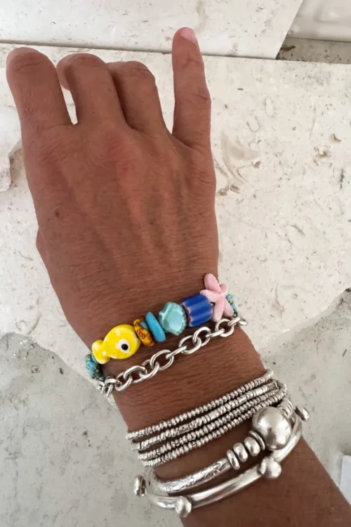 fish macrame bracelet adjustable colourful purple. perfect to add colour to a bracelet. stack this summer.