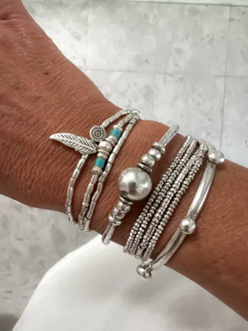 bohemian style silver jewellery. Pure silver wrap bracelet with silver feather and turquoise seed bead - for a beach vibes look- water safe for everyday wear. 3 styles in 1