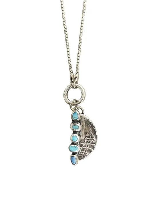 handmade sterling silver crescent pendant with natural golden hill turquoise gemstones. Comes on a sterling silver chain. Please select length. Made by Rico Designs in Sydney Australia