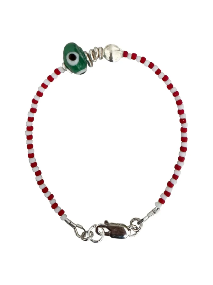 Handmade pure silver bracelet featuring colourful seed beads and an evil eye – a great minimal bracelet to add to your bracelet stack