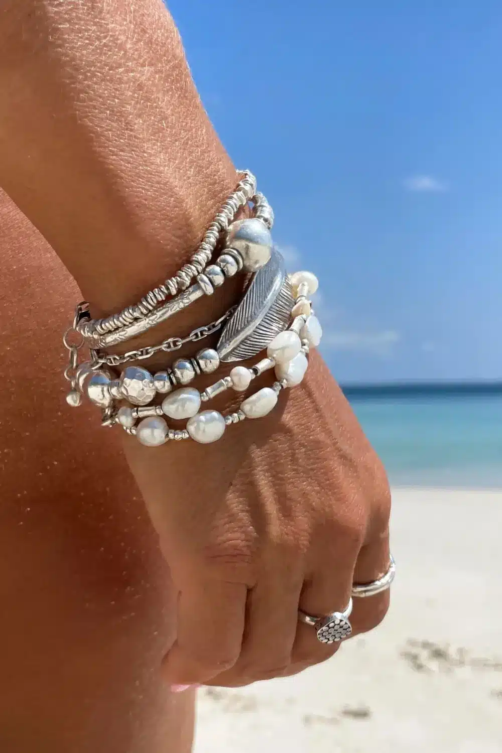 chunky pure silver bracelet perfect for stacking. large curve leaf for bohemian style. easy to slip on stretch elastic curve leaf bracelet