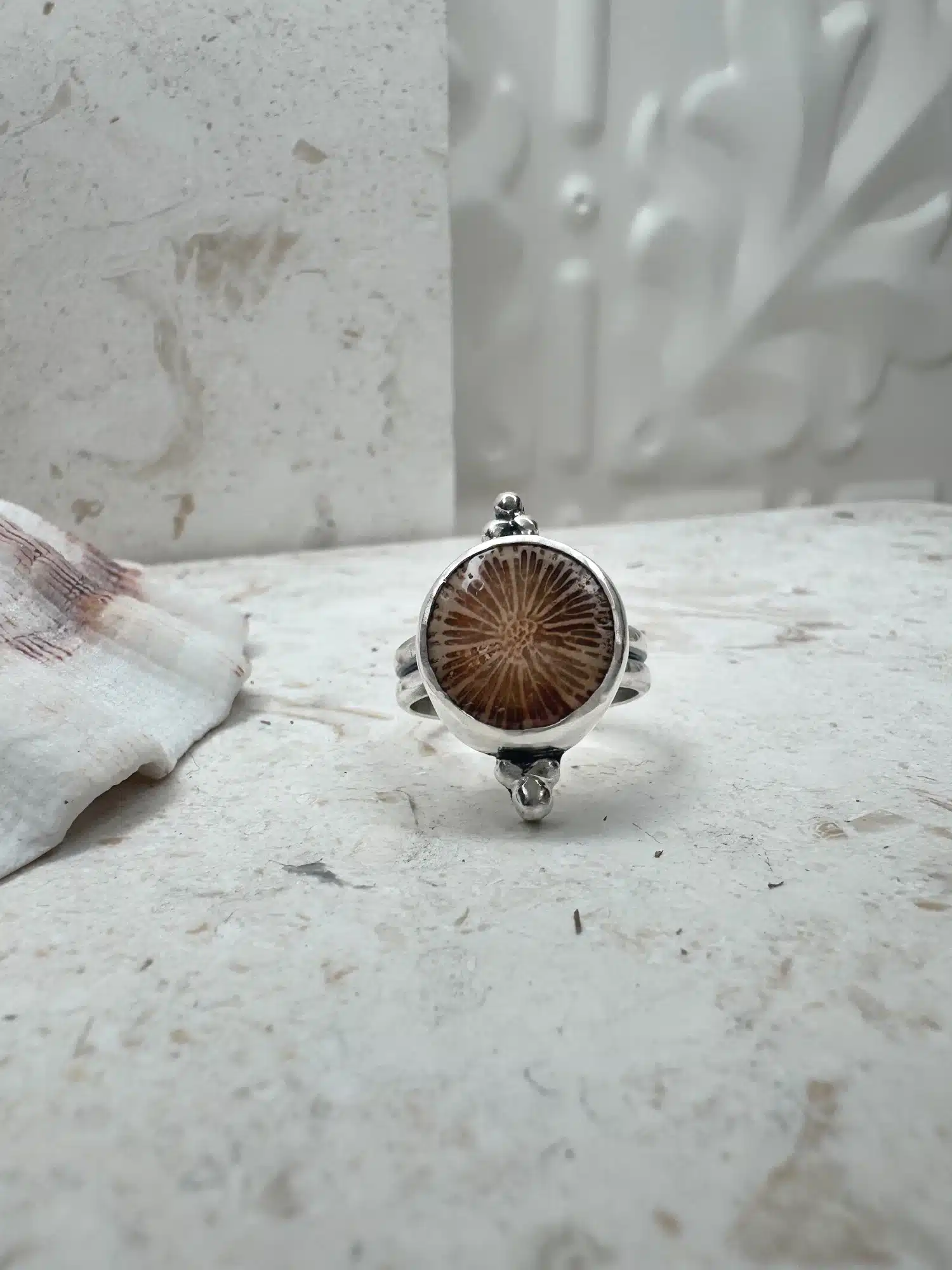 handmade sterling silver fossilised coral ring. inspired by the ocean. Unique jewellery