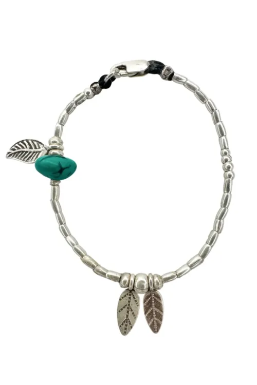 pure silver bracelet with 2 leaf pendants and single turquoise nugget gemstone