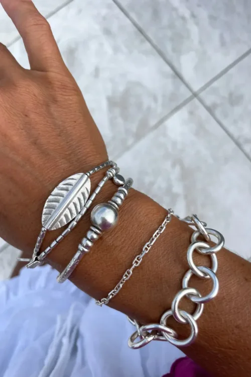 pure silver bracelet with large leaf centre. ocean safe silver jewelry