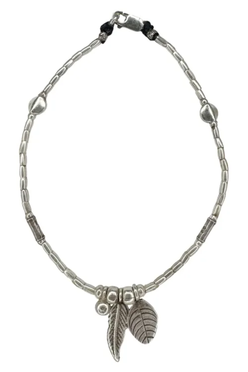 boho luxe pure silver anklet with silver feather and leaf charms. Everyday staple jewellery - designed to wear everyday. Ocean safe