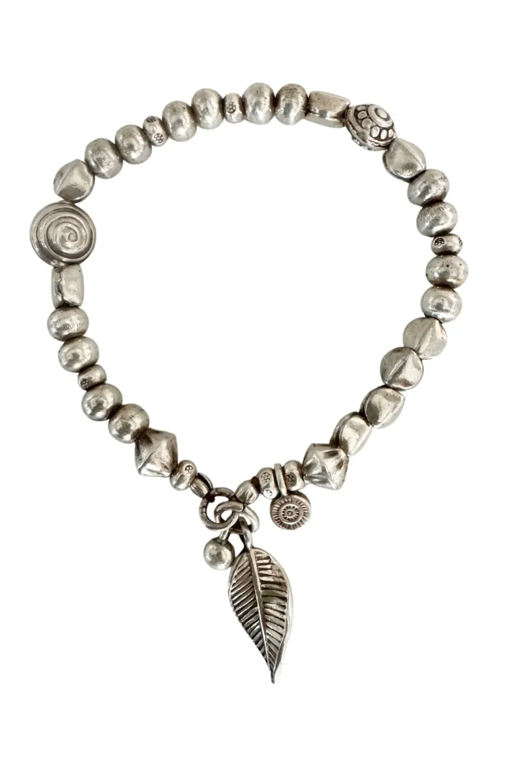 handmade pure silver bracelet. perfect for a bracelet stack. Stitch elastic so easy to slip on. ocean safe