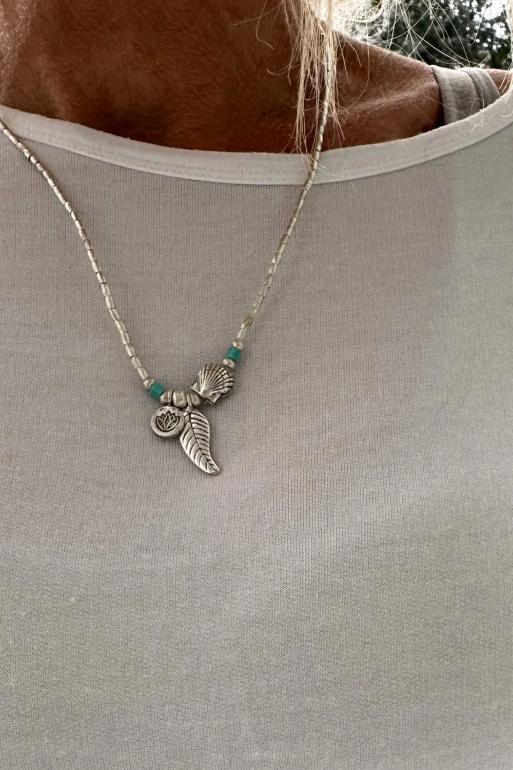 ocean inspired silver jewellery. Pure silver wrap bracelet with clam shell for a beach vibes look- water safe for everyday wear. 3 styles in 1