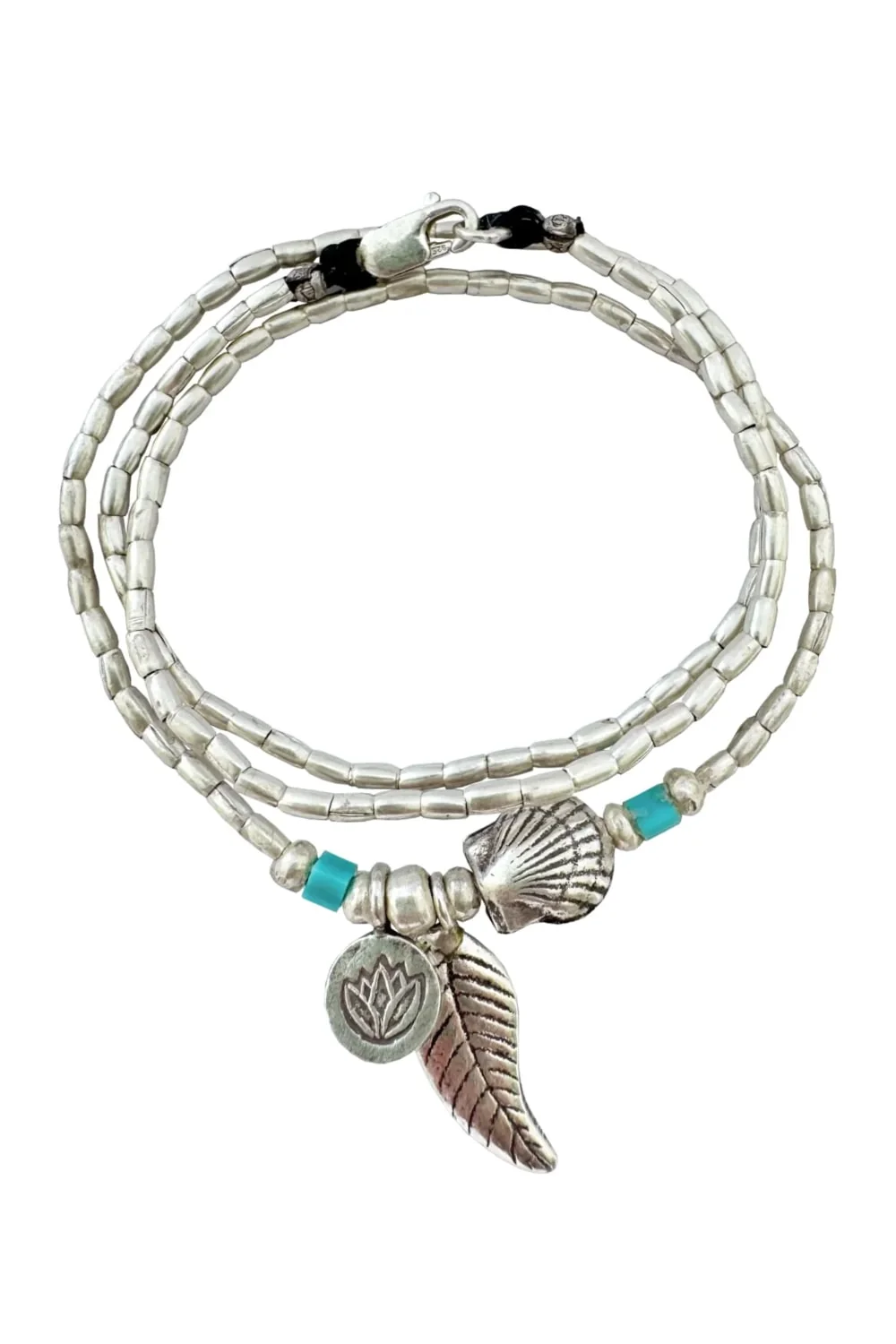 ocean inspired silver jewellery. Pure silver wrap bracelet with clam shell for a beach vibes look- water safe for everyday wear. 3 styles in 1