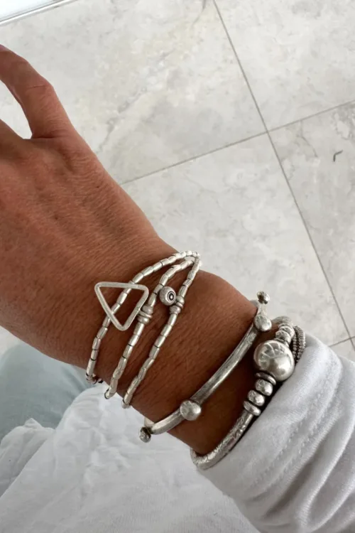 triangle pendant sterling silver wrap bracelet with evil eye pendant. 3 ways to wear - wrap, anklet-necklace