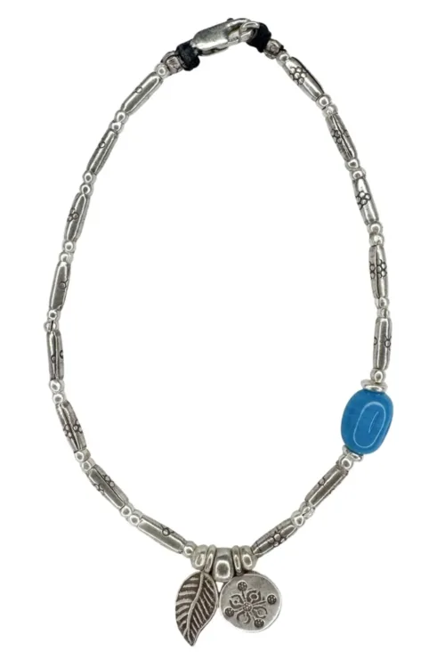 boho luxe pure silver anklet with sea blue glass bead and silver charms. Everyday staple jewellery - designed to wear everyday. Ocean safe