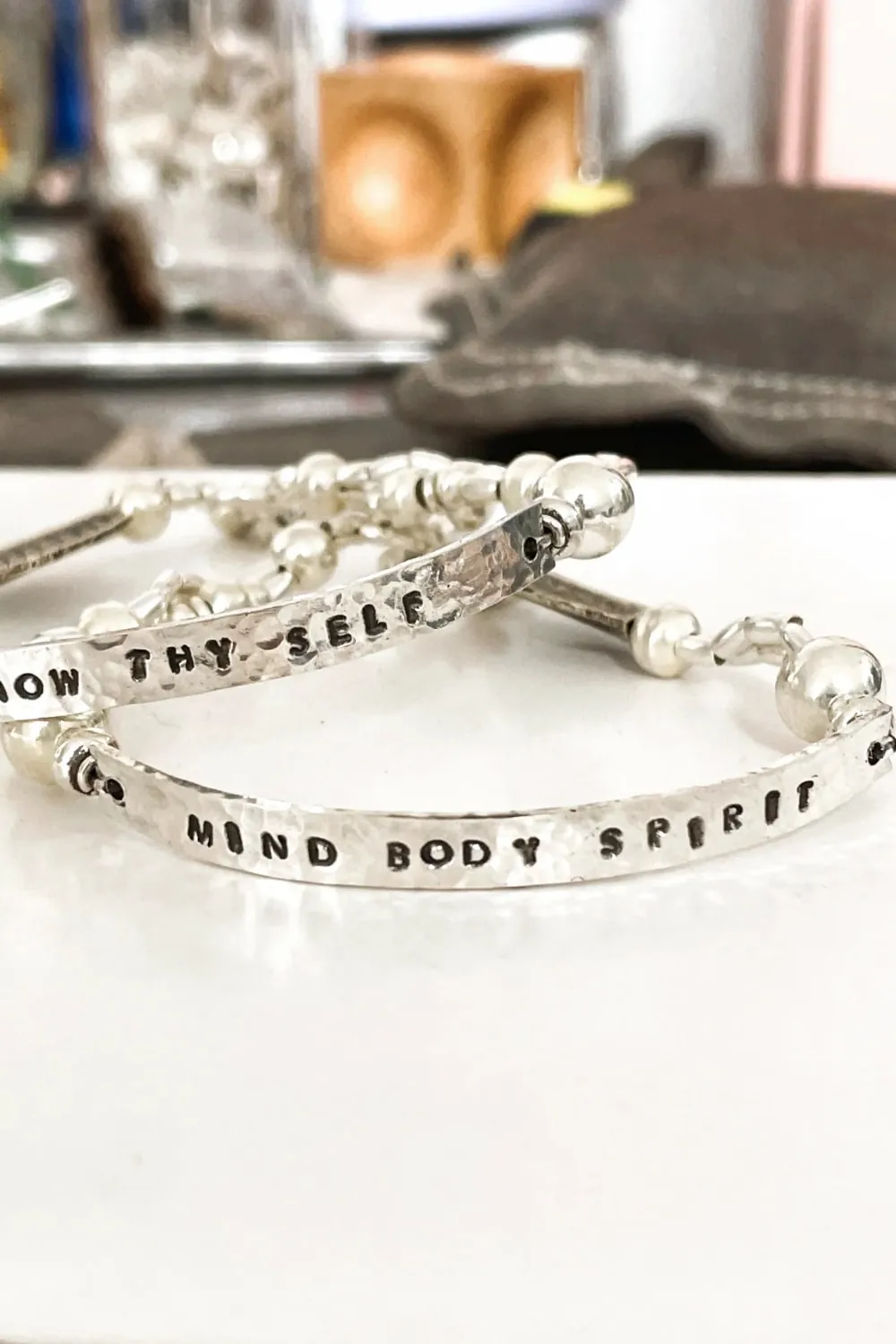 customisable hand stamped bracelet. sterling silver stretch bracelet for the active adventurer. water safe